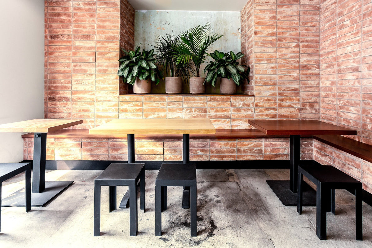 Banquette wall with planter niche
