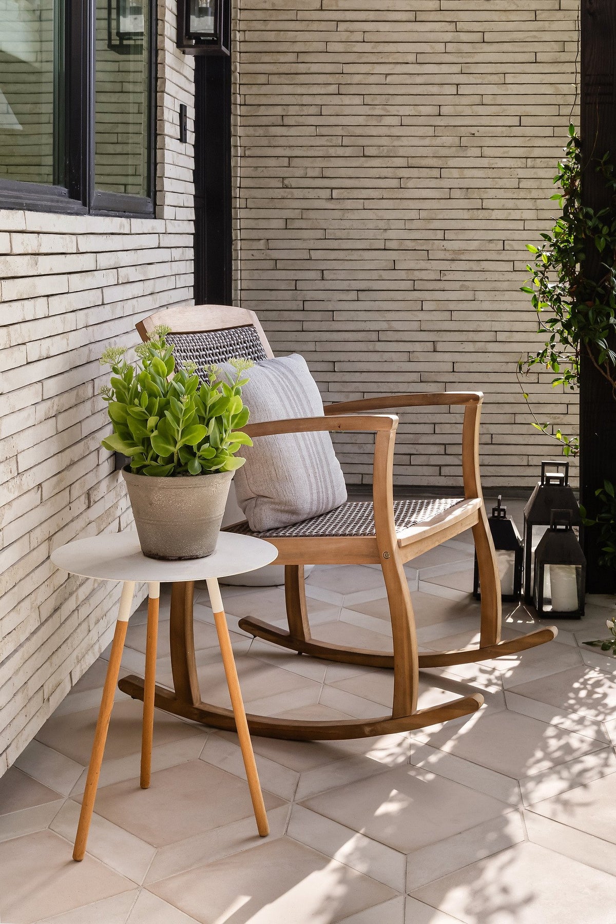 Front porch along the brick wall
