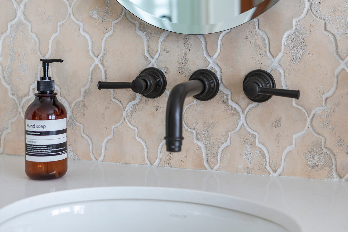 Bronze faucet on Hacienda tile