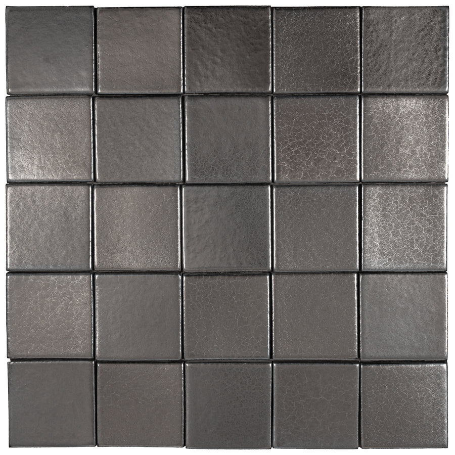 A field of Platinum tiles laid square, the gloss surface breaking the light into bright and dark faces
