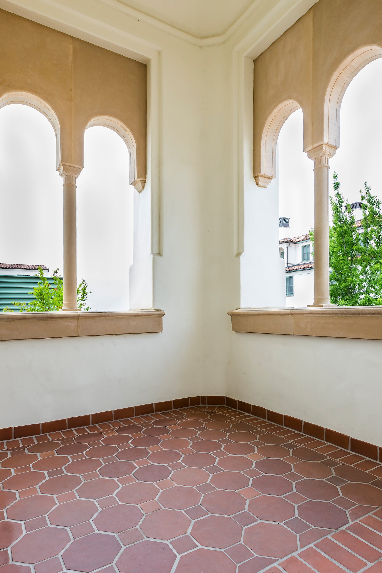 Monrovia octagons and their squares in an arcaded corner