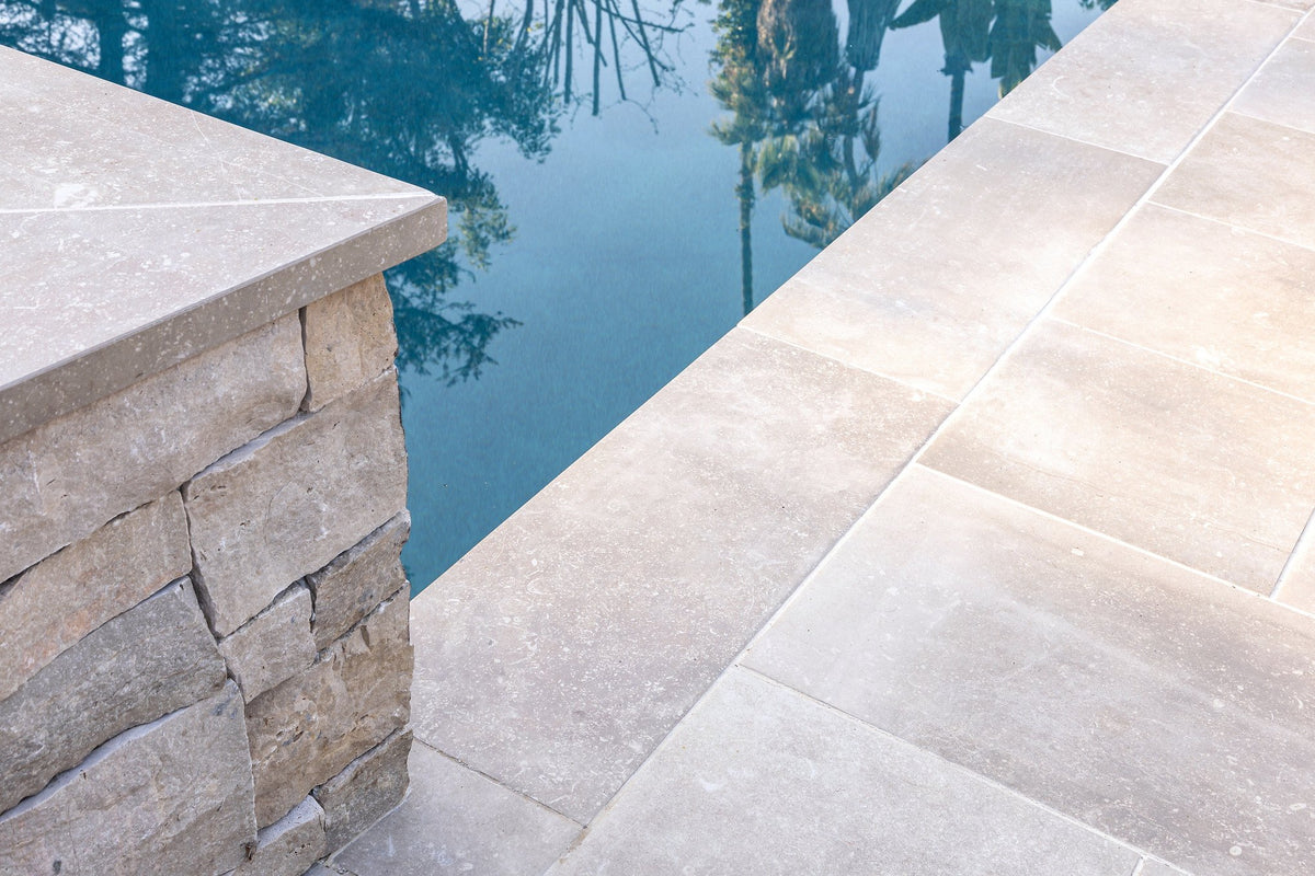 Coping over a stacked stone wall