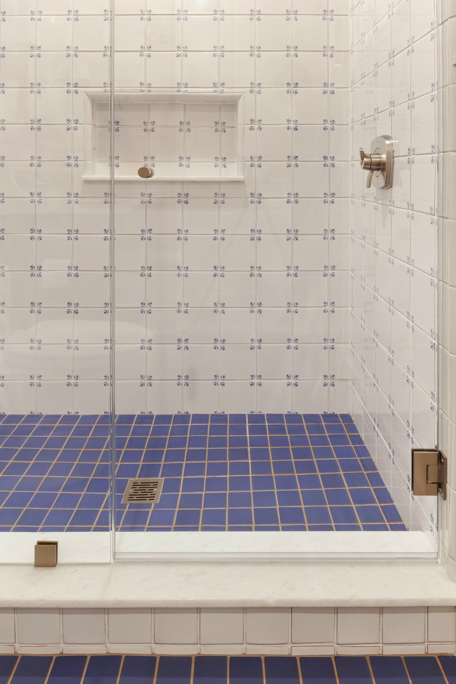The same bath, with a blue floor underfoot