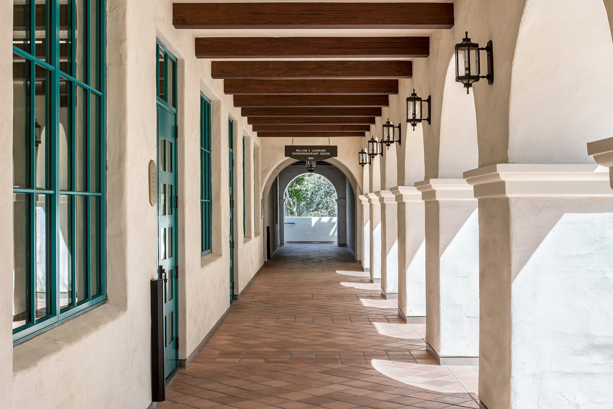 Sunlit arches along the walkway