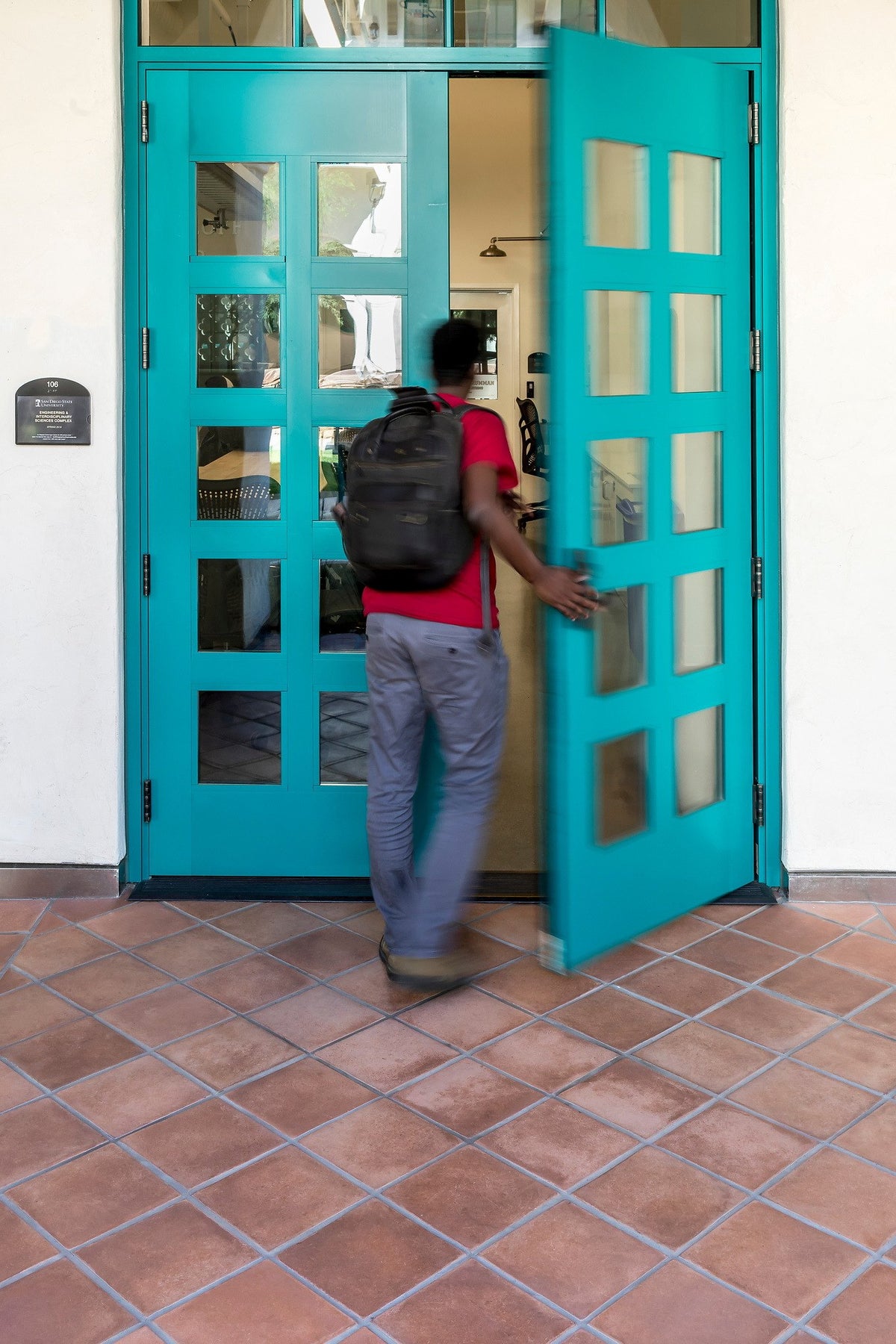Teal doors opening onto Artillo