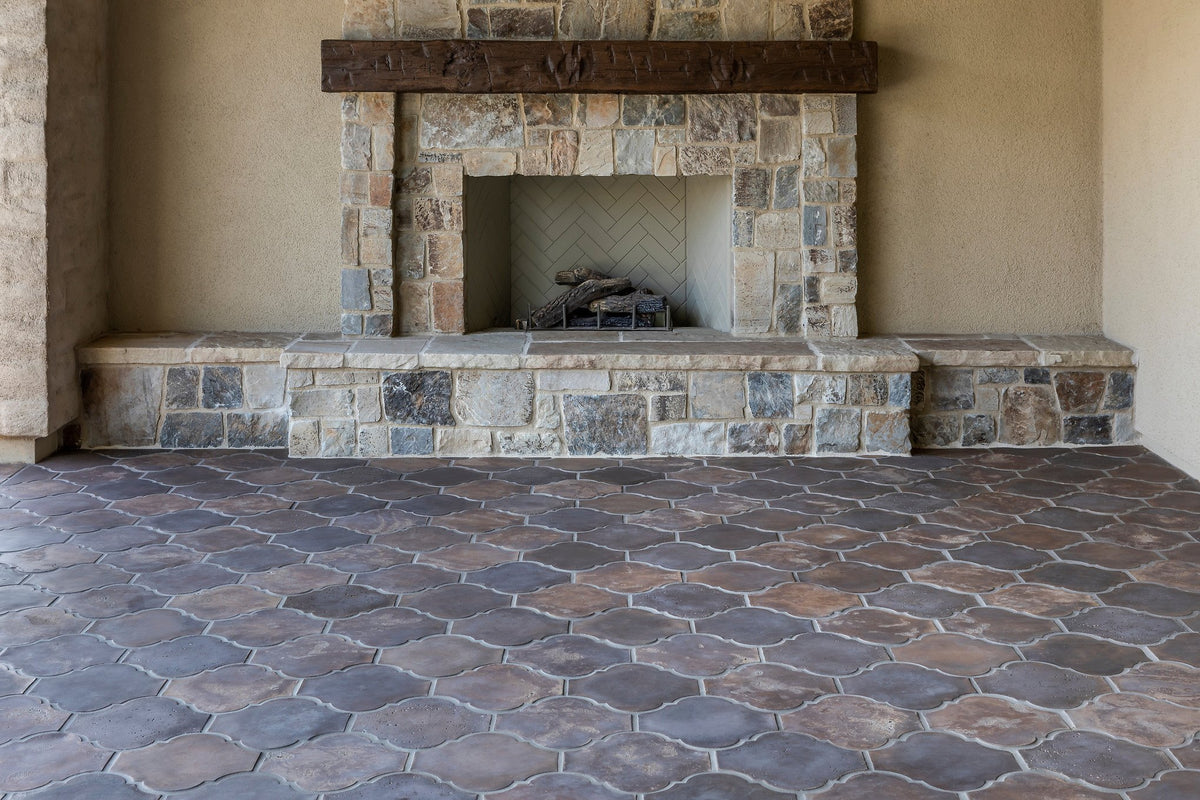 Stone fireplace over the tile floor