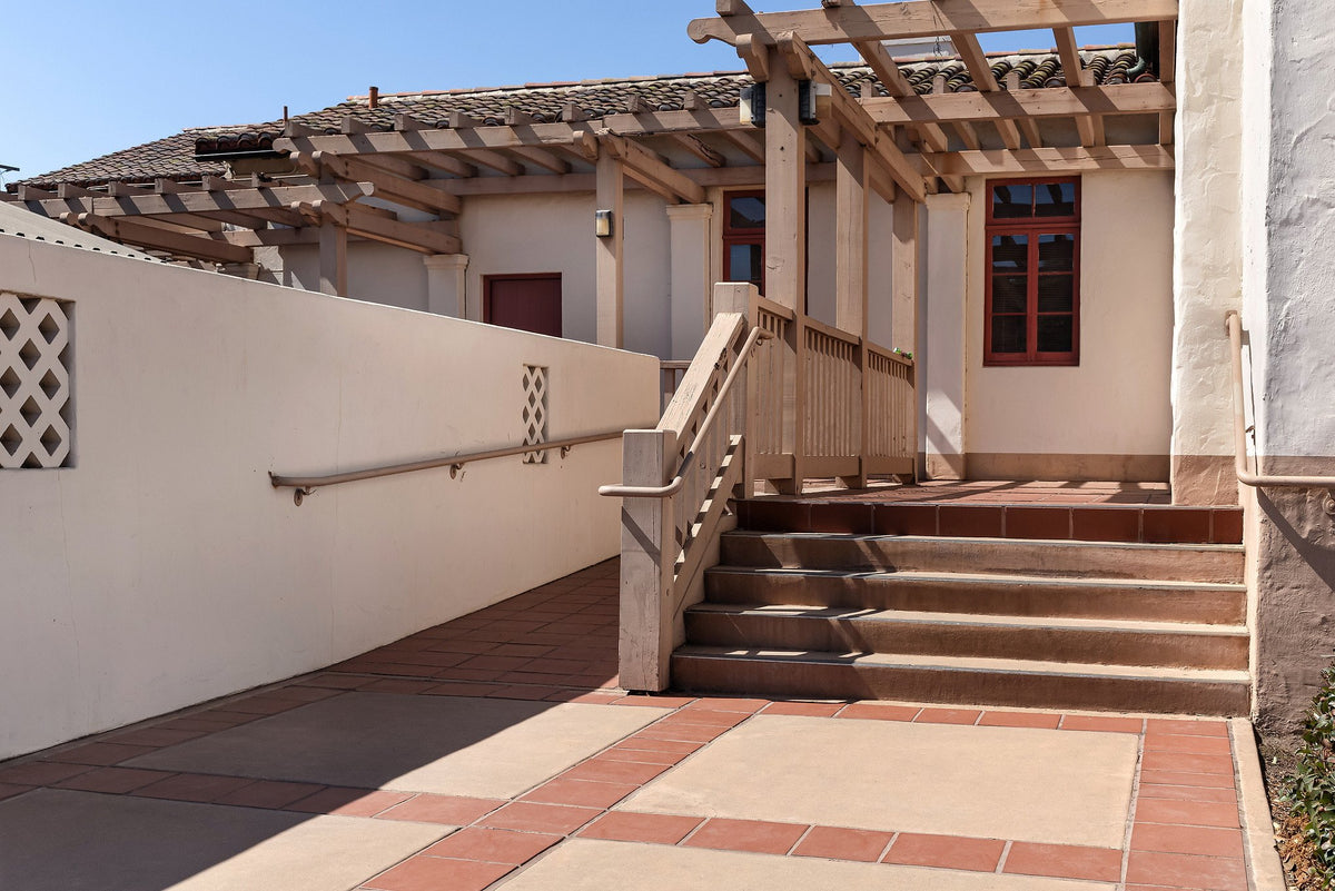 Steps and pergola at the rear entry