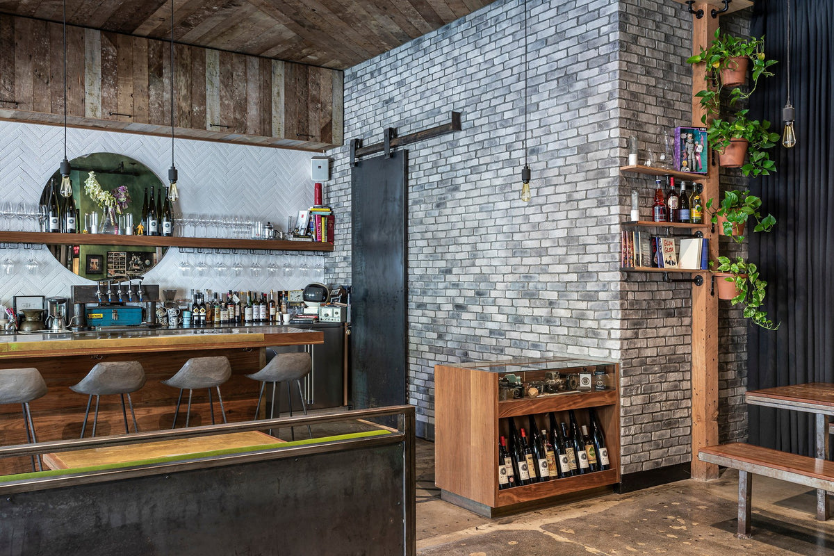 Brick column beside the bar