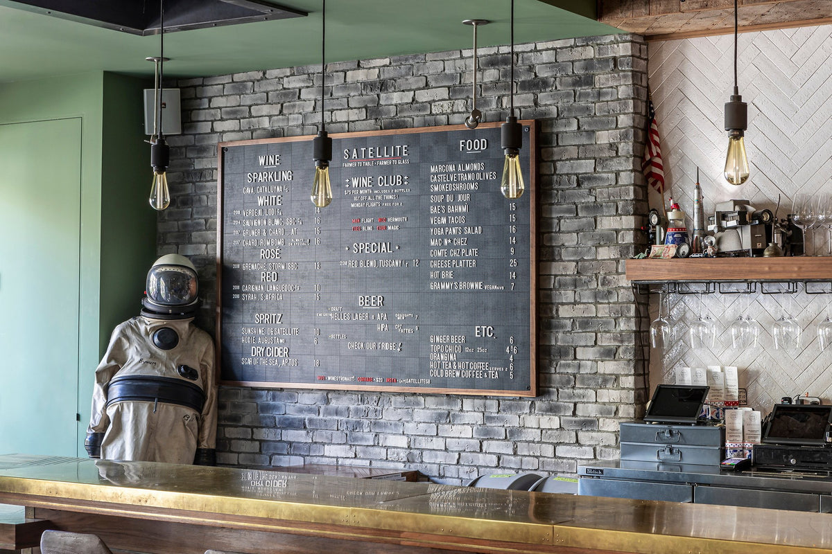Chalkboard menu on the brick wall