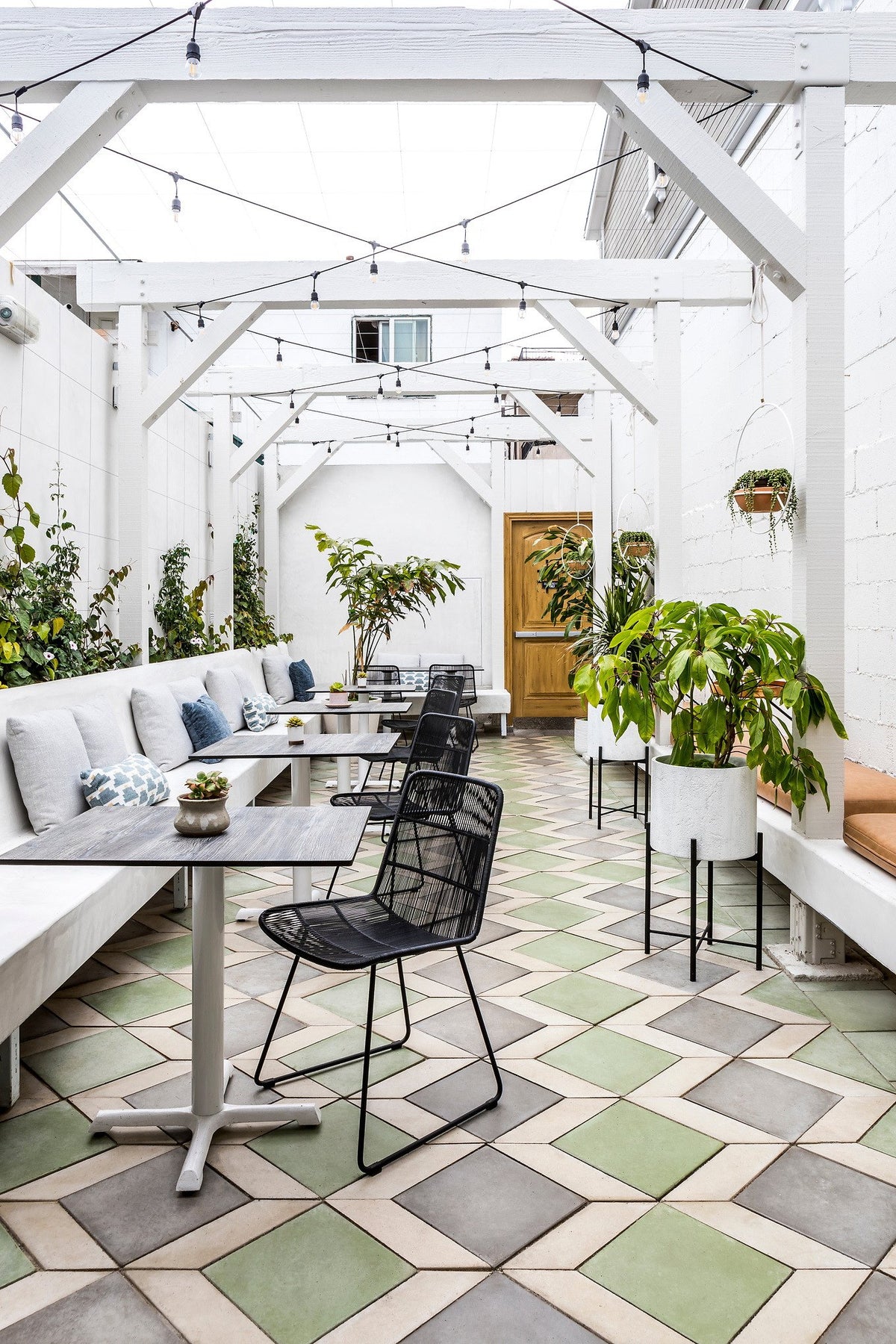 Long view under the white pergola