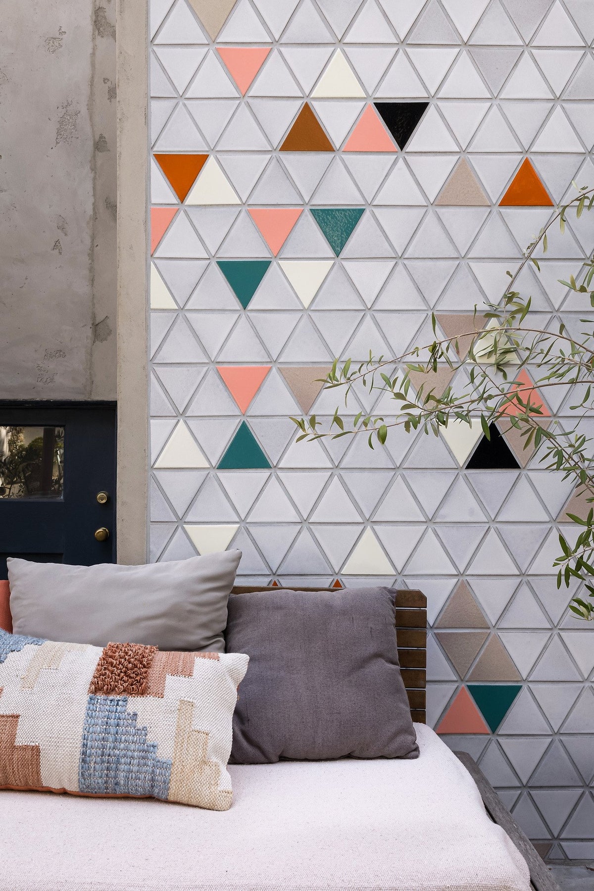 Triangle wall behind the daybed