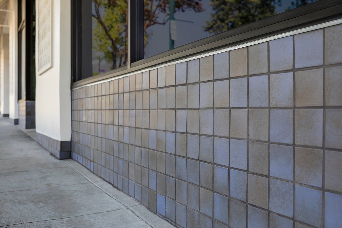 Wainscot running along the storefront