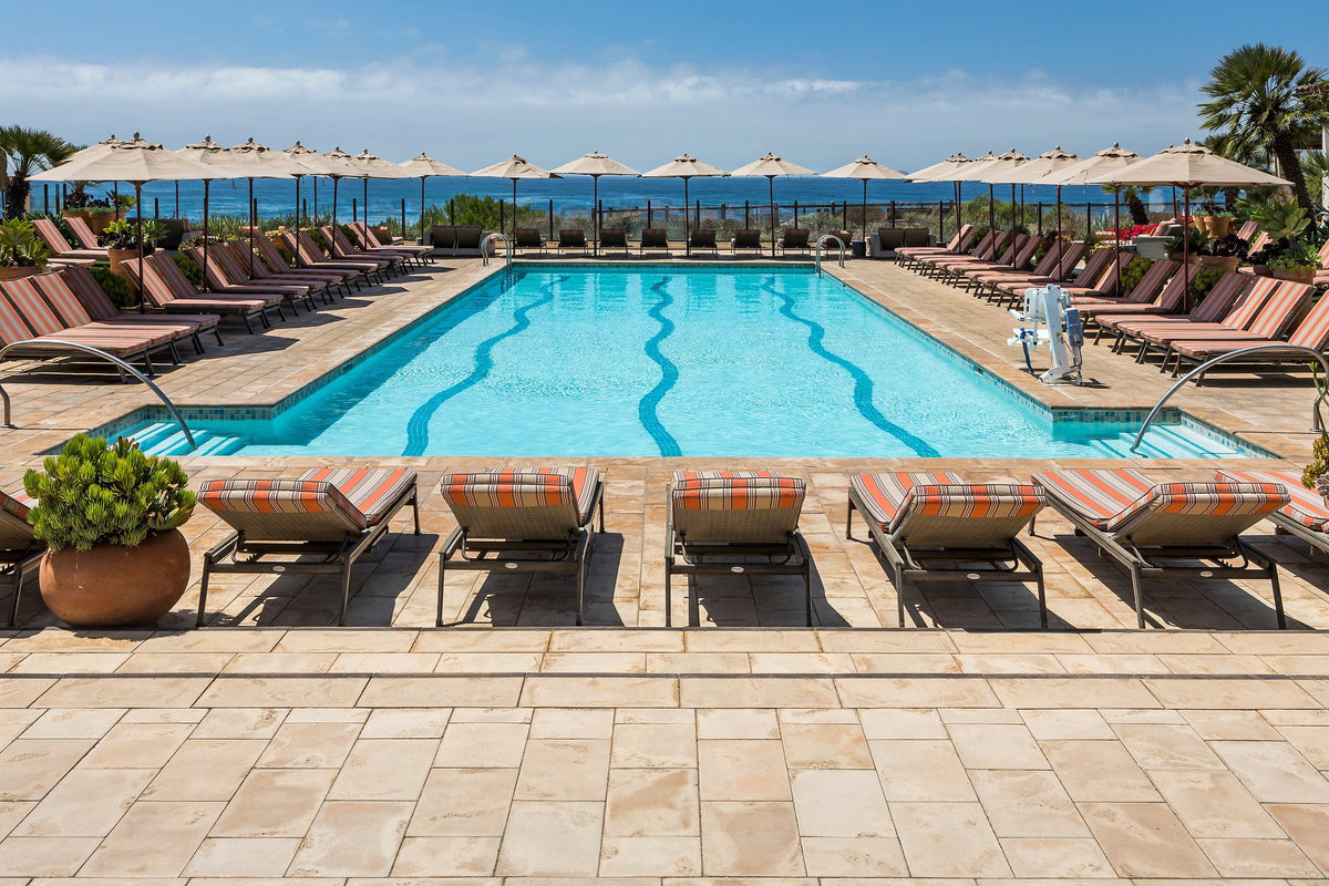 Ocean-view pool deck in Roman pavers