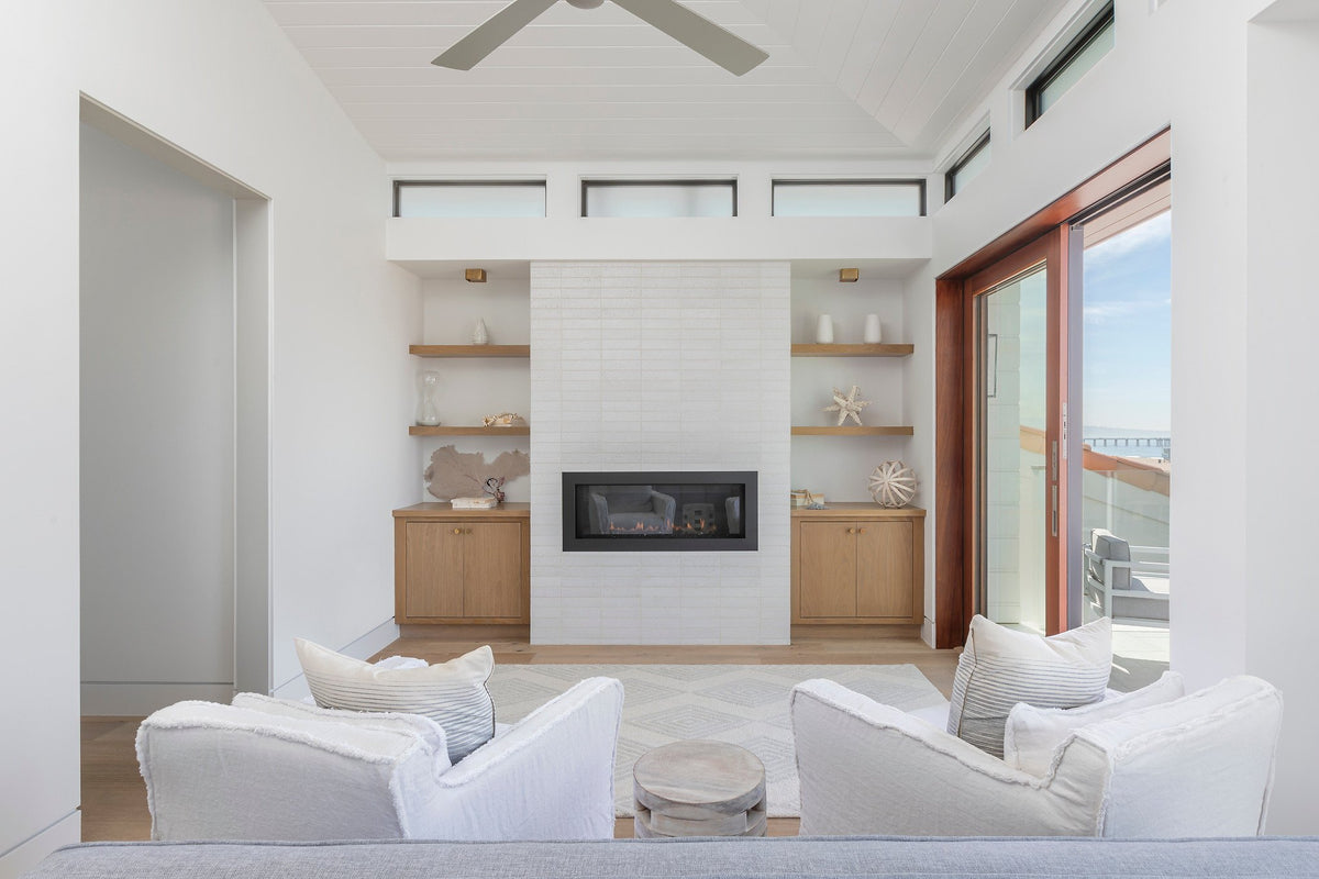Living room with glazed brick fireplace