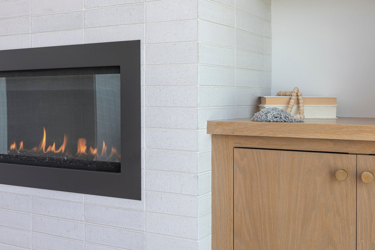 Pure White glazed brick by the firebox