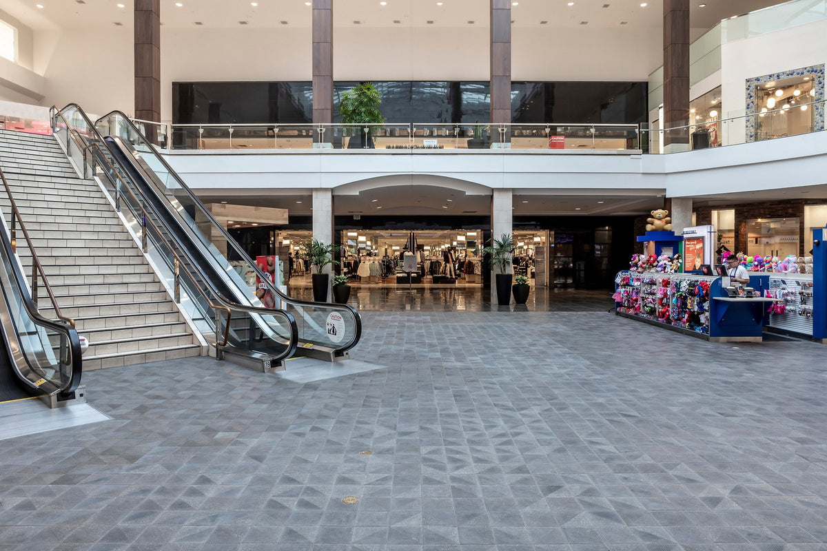 Escalator court on Charcoal tile