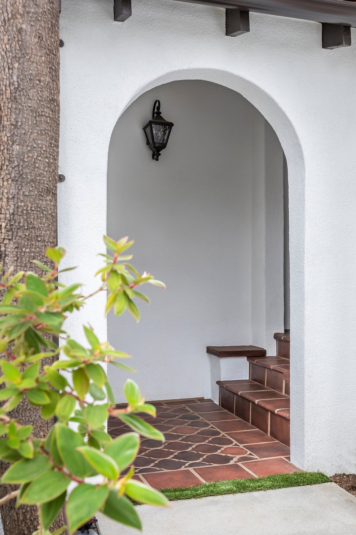 Arched porch beside the garden
