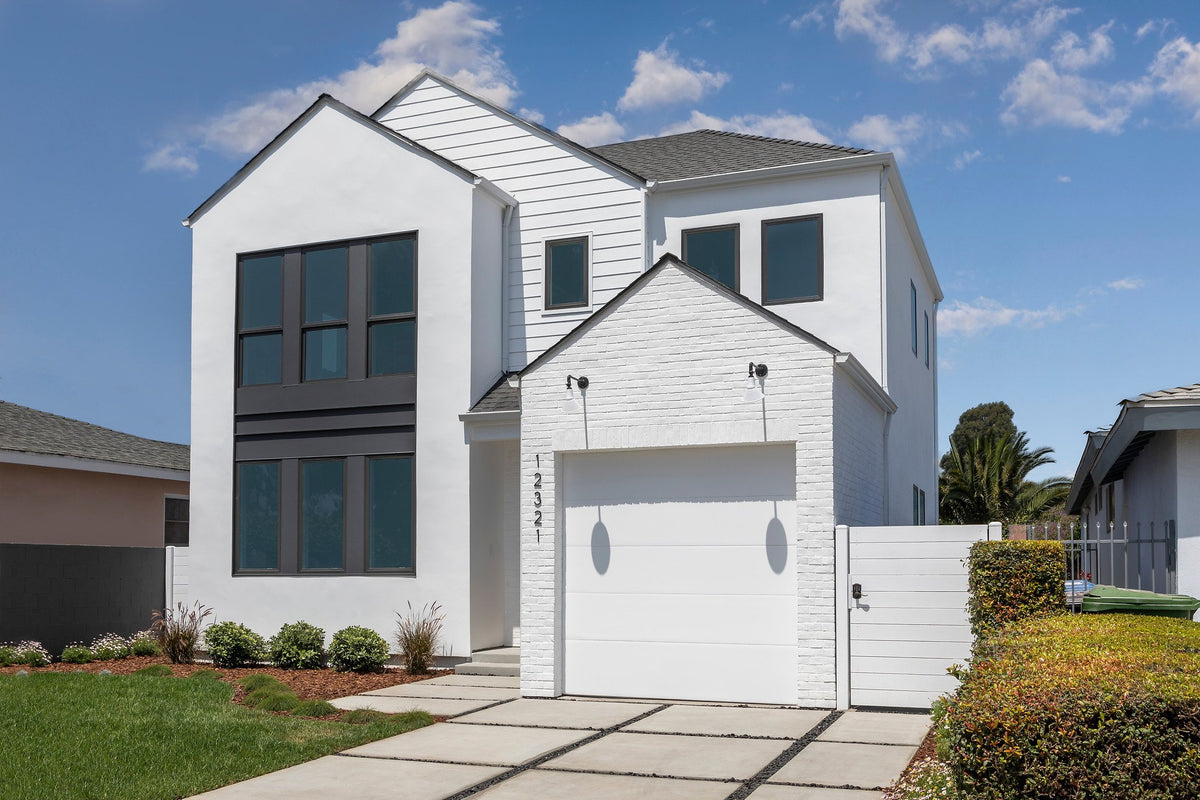 Gabled facade in white-painted brick