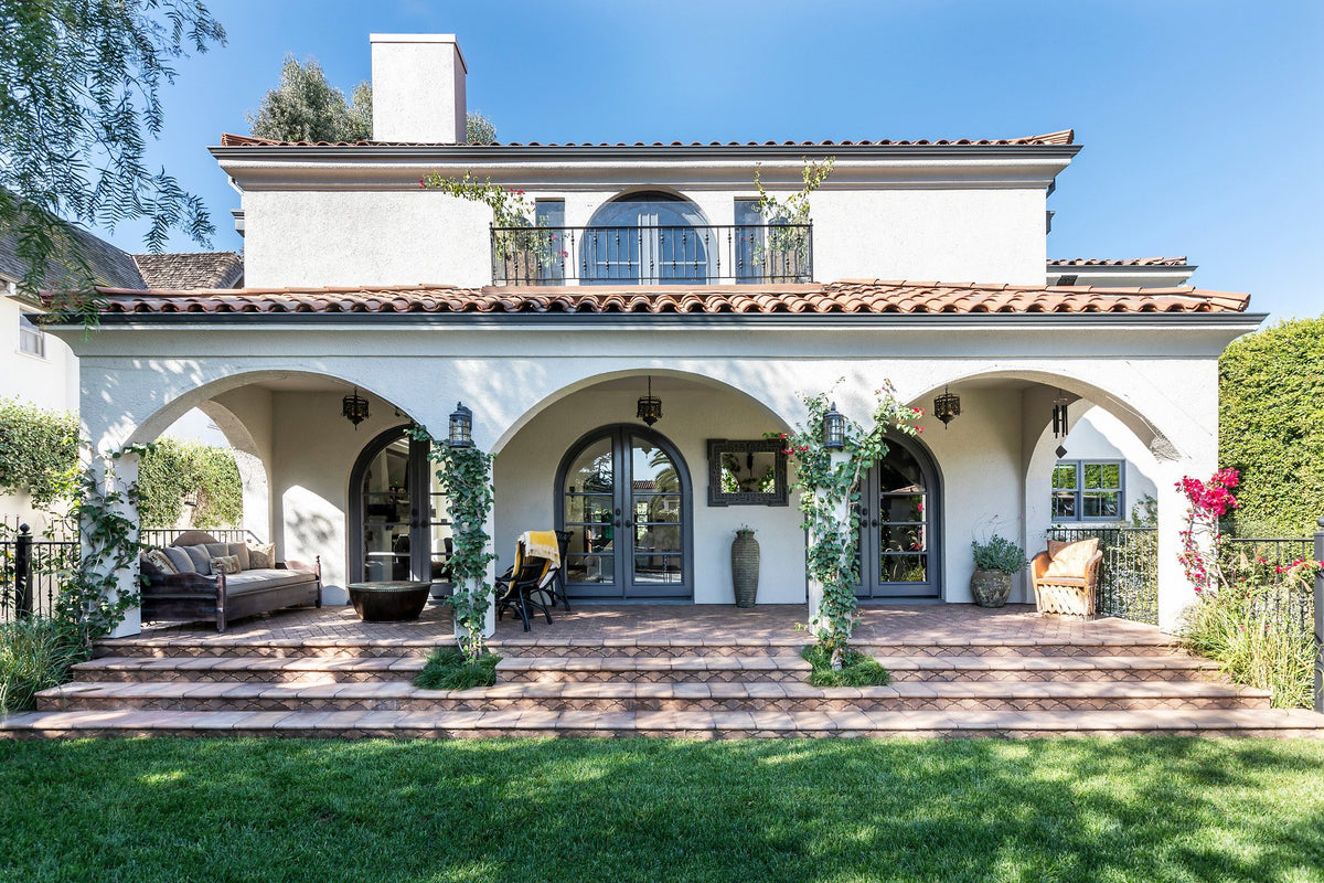 Spanish-style home with Arabesque patio